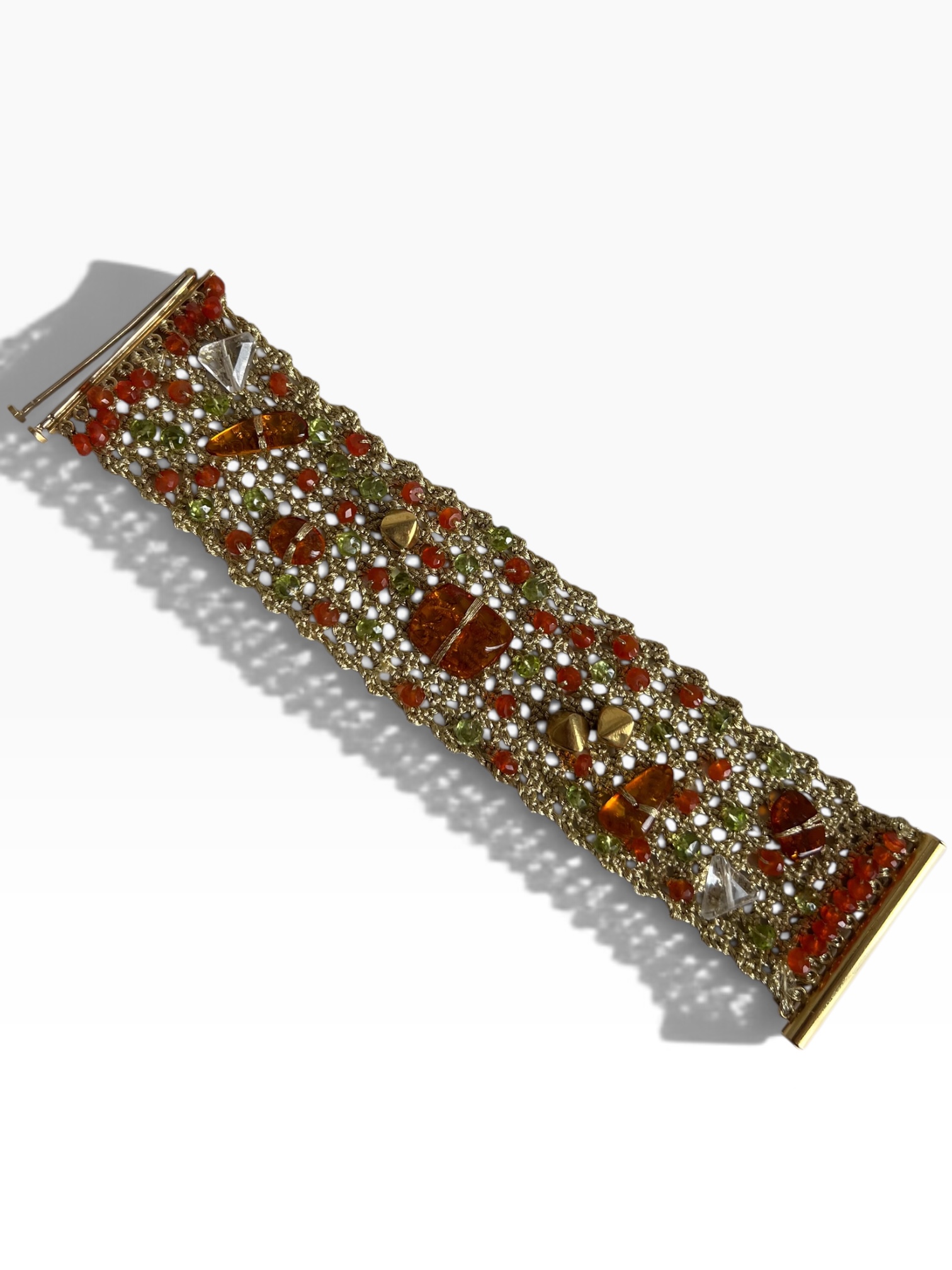Bracciale in tessuto con pietre varie e chiusura in oro