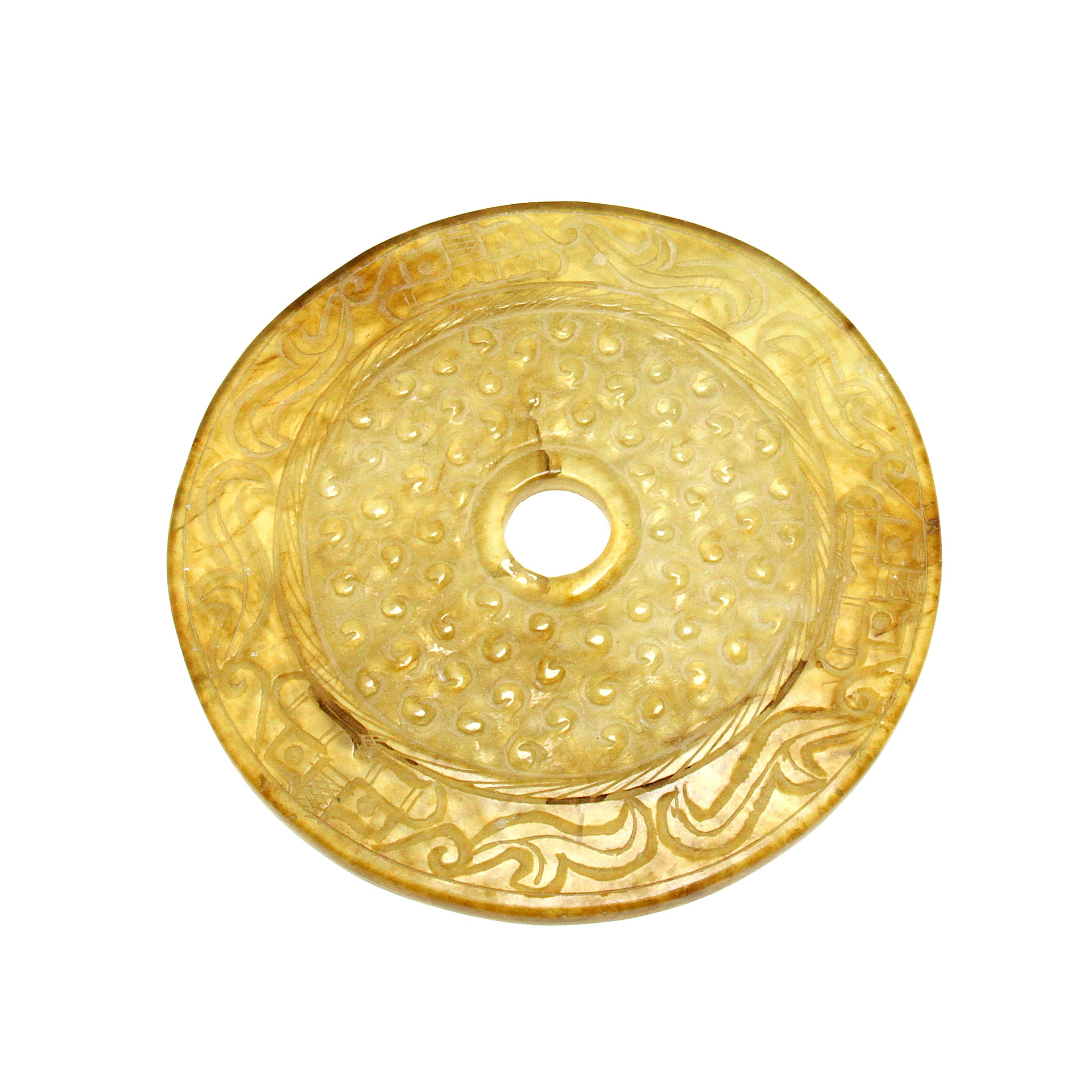 Manufatto antico di giada incisa, disco Bi
